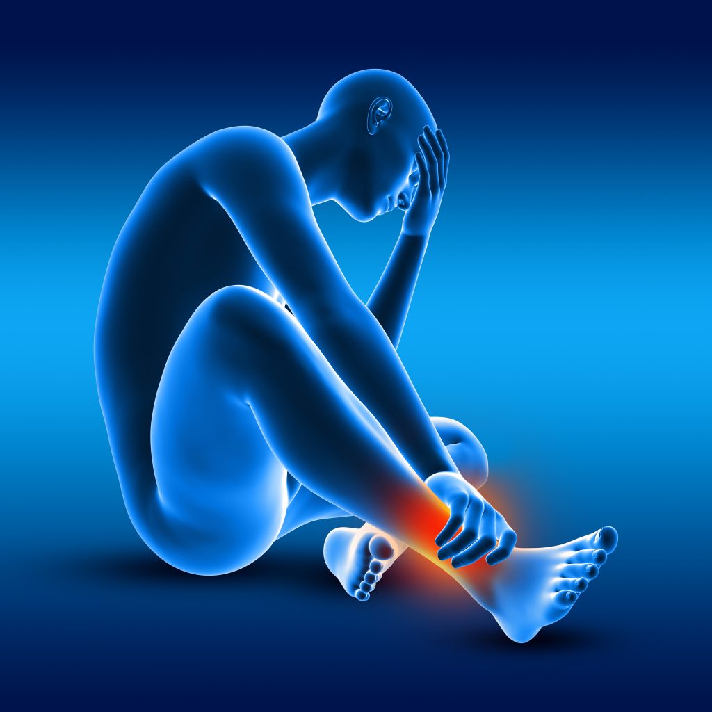 3d male medical figure holding his ankle in pain